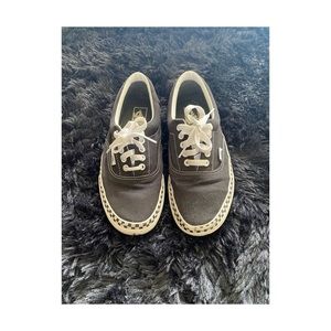 Women’s black checkered vans